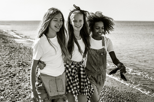 Happy teenage girls on holidays. Black and white photo