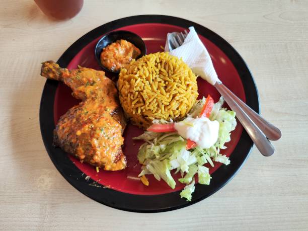 istock Mandhi Rice with spicy chicken and salad 1488541264