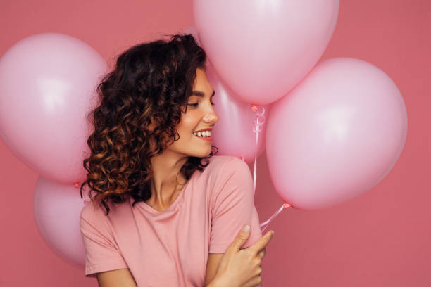 istock Woman with air balloons 1488541525