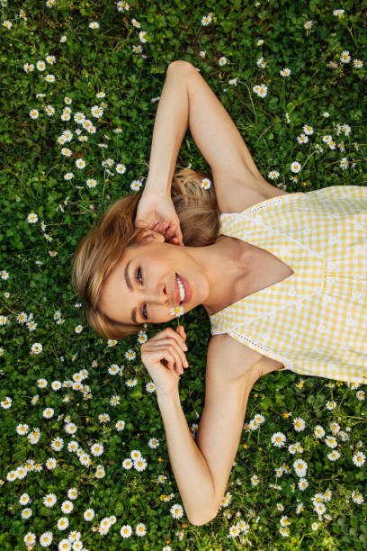 istock Smiling young woman enjoying summer 1488542422