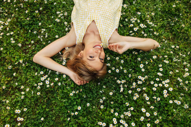 istock Smiling young woman enjoying summer 1488542450
