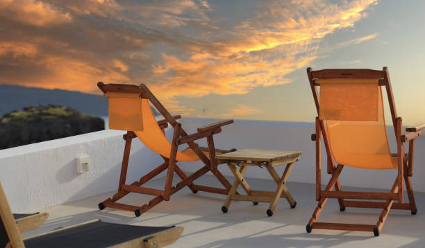 istock The Deck chair with summer tropical view and sunset sky background 1488544242