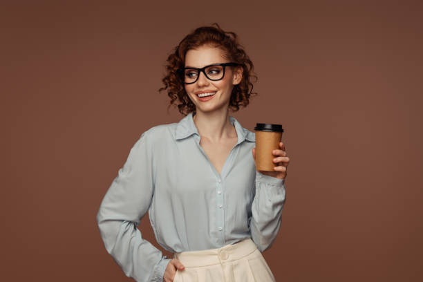 istock Beautiful emotional woman drinking coffee 1488544314