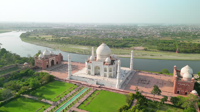 Taj Mahal, India: Aerial view of of iconic monument in city Agra (Uttar Pradesh), famous marble mausoleum on right bank of river Yamuna - landscape panorama of South Asia from above