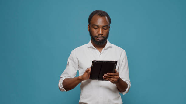 istock Businessman working on digital tablet to browse internet 1488550509