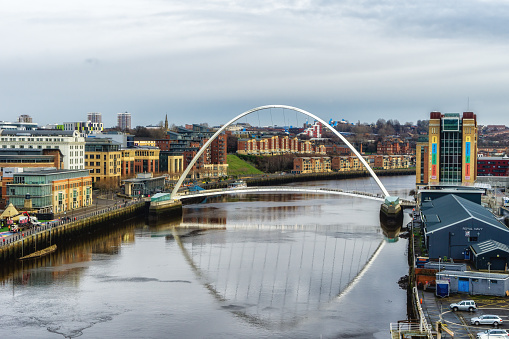 The Iconic Millennium Bridge crosses the River Tyne joining the Quaysides of Newcastle and Gateshead for cycles and pedestrians