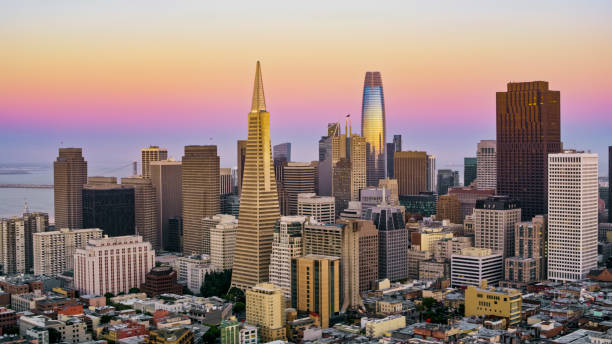 View of San Francisco City Aerial view of skyscraper buildings in city during dusk, San Francisco, California, USA. transamerica pyramid san francisco stock pictures, royalty-free photos & images