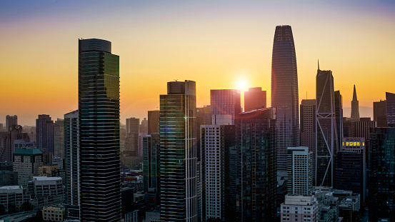 Aerial view of financial buildings in San Francisco City during sunset, California, USA.