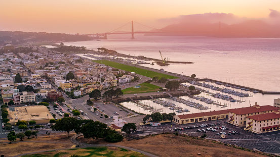 Aerial view of Fort Mason with Golden Gate Bridge in background, San Francisco, California, USA
