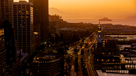 Aerial view of financial district's waterfront harbour at dusk, San Francisco, California, USA.