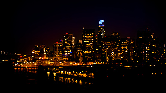 Aerial view of skyscrapers of downtown city at night, San Francisco, California, USA.