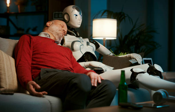 istock Man falling asleep next to his female humanoid robot 1488554603