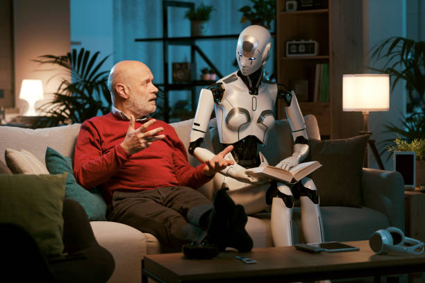 Senior man and android robot reading a book together stock photo