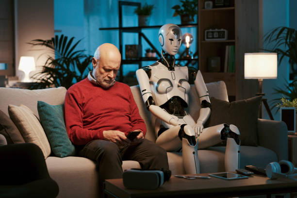 istock Man sitting on the couch with his humanoid robot 1488554749