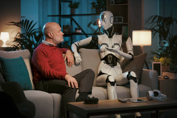 istock Senior man and AI robot talking together at home 1488556287