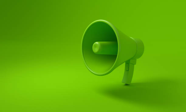 megafon na zielonym tle, koncepcja zrównoważonego rozwoju. - environmental conservation audio zdjęcia i obrazy z banku zdjęć