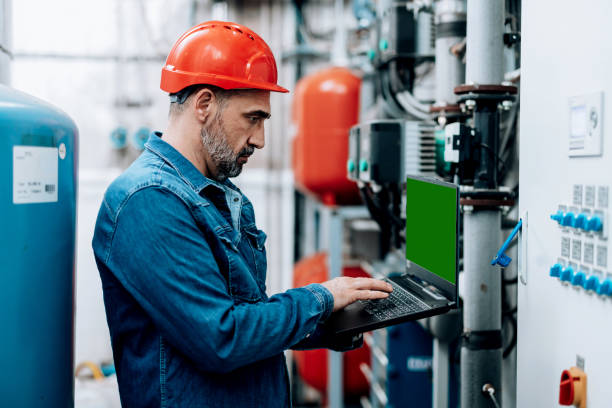 istock Inspecting the heating plant switches 1488562566
