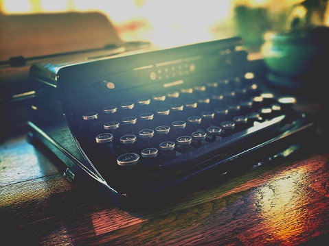 Close up of vintage typewriter keys with selective focus.