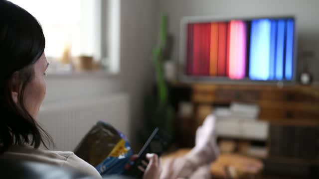 Woman watching Netflix smart TV