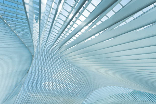 Modern Architecture in Railroad Station Interior of the modern architecture railway station in Liege-Guillemins. architectural feature stock pictures, royalty-free photos & images