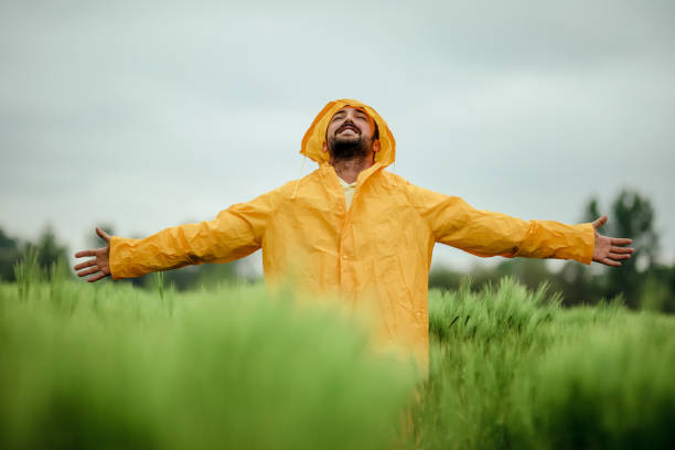 clean air nature walk, green energy , the man who is happy in nature - white mid air rain wind imagens e fotografias de stock