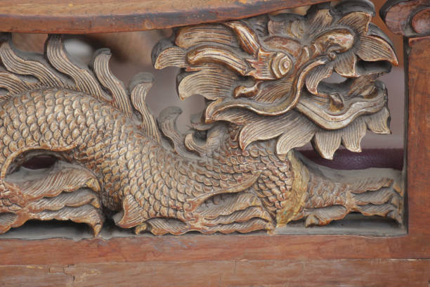 istock Chinese dragon carved in wood 1488574994