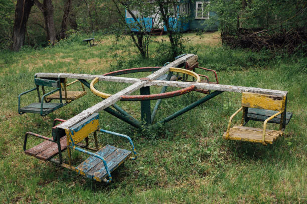 an old abandoned children's swing
