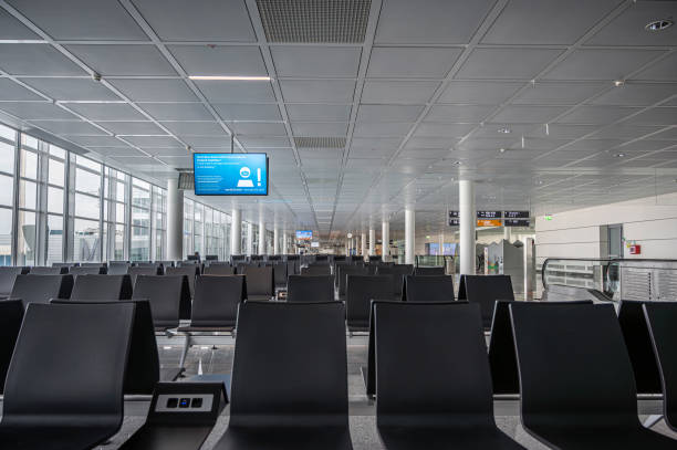 Empty Munich airport waiting area near gate. Munich, Germany - May 5, 2023: Empty Munich airport waiting area near gate. munich airport stock pictures, royalty-free photos & images