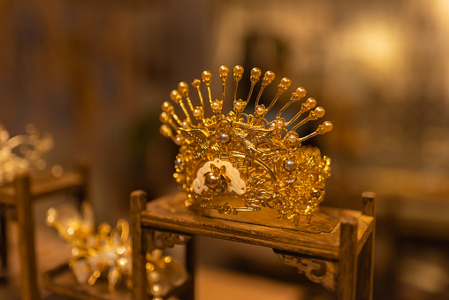 The gold crown on the wooden shelf, chinese style, craft product