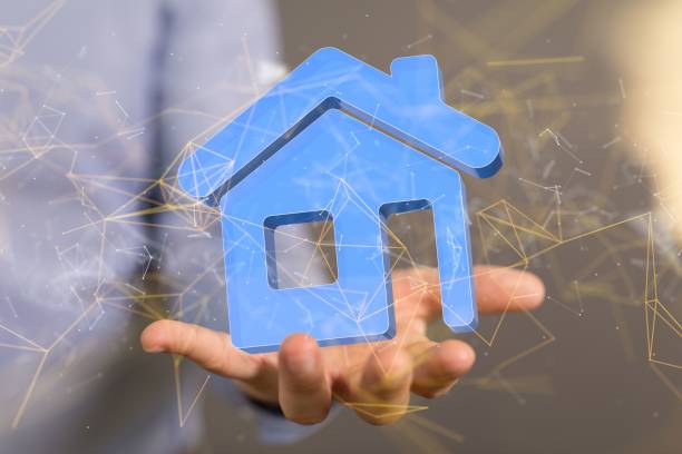 istock Person holding a 3D blue house in his hand 1488578728
