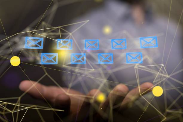 istock Hand holding some email icons in the air 1488579906
