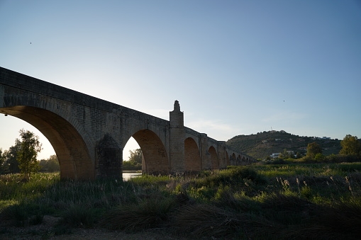 Medellin with Roman bridge over the Guadiana in Spain