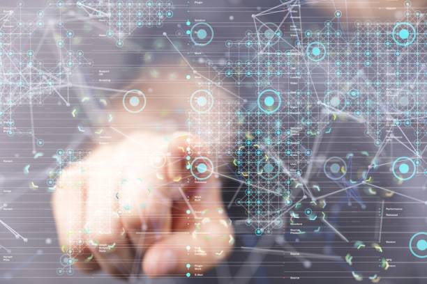 istock Businessman pointing to a graphic of digital data system 1488581414