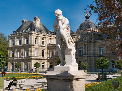 Paris, France - May 3, 2023: statue of Marius with the Luxembourg Palace (Senate) on the back