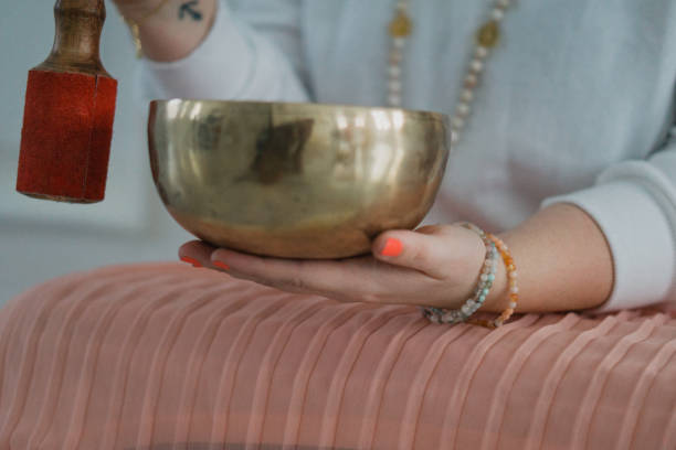 istock singing bowl beind played in hand 1488585260