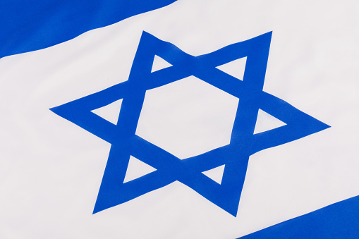 Close up of the Israeli Flag with the Star of David and copy space
