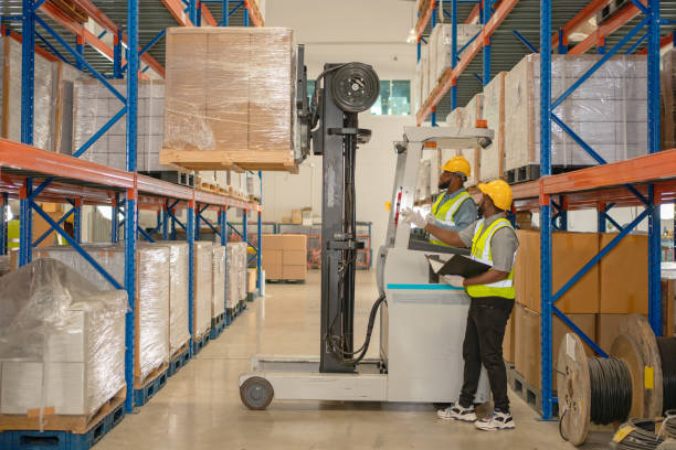istock A male manager is checking inventory inside a warehouse. 1488590012