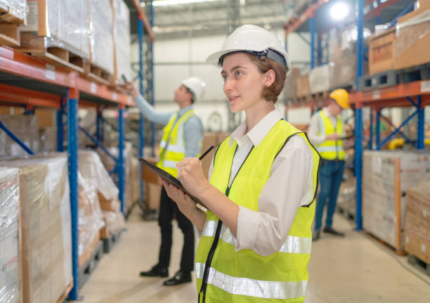 istock A female manager is checking inventory inside a warehouse. 1488590201