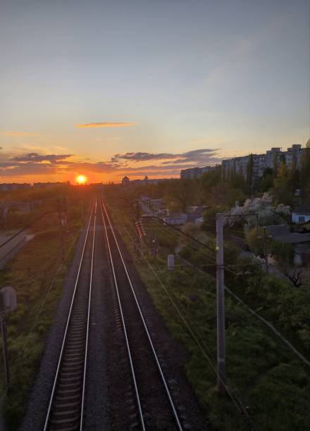 istock Sunset and railway in town 1488600014
