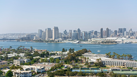 Aerial view of modern downtown district against sky, San Diego Bay, San Diego, California, USA.