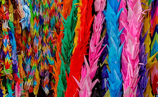 Multicolored folding paper cranes (Origami), commemorating for victims of nuclear war, Hiroshima, Japan