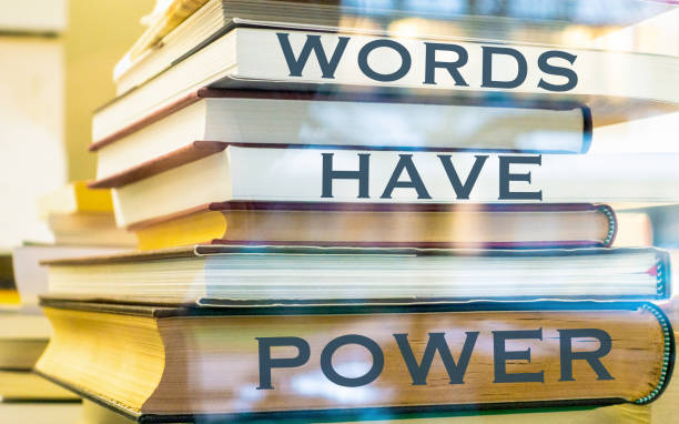 istock Large stack of books and the sentence: WORDS HAVE POWER 1488604156