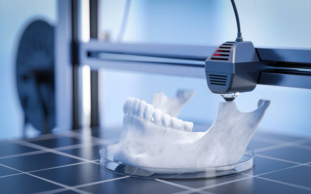drukowanie ludzkiej szczęki wraz z zębami za pomocą bioprintingu 3d - przyszłość stomatologii i medycyny. ilustracja 3d - drukowanie przestrzenne zdjęcia i obrazy z banku zdjęć