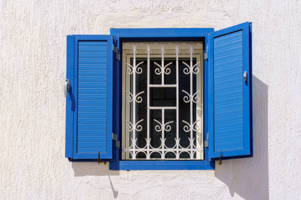 View of a window with blue shutter, the Kasbah of the Udayas, in Rabat, Morocco