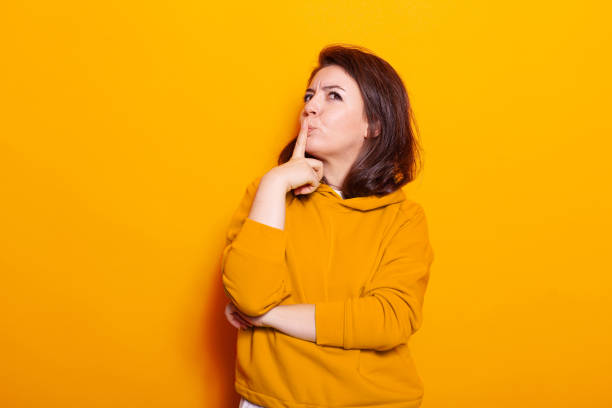 istock Pensive adult feeling thoughtful about question 1488611388