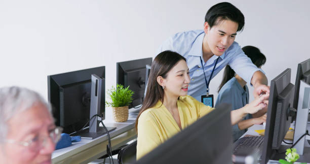 istock teacher in adult education class 1488612674