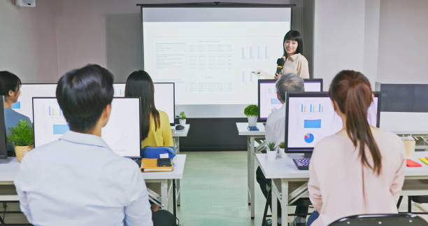 istock teacher in adult education class 1488612943