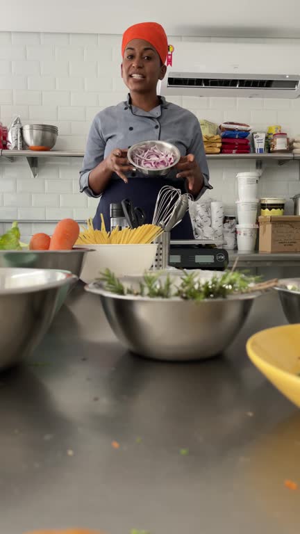 Chef filming a virtual cooking class in the kitchen