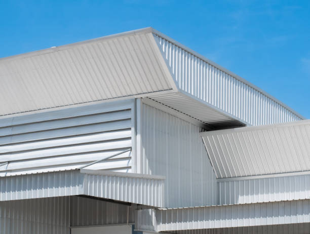 istock metal sheet roofing on commercial construction with blue sky 1488614247