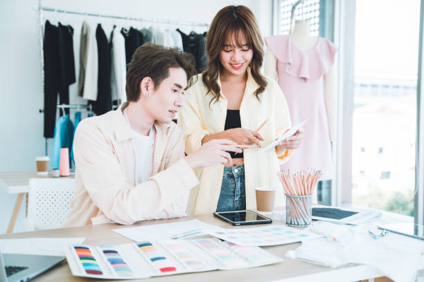 istock Young designers are choosing the right fabric colors for tailoring. 1488614763